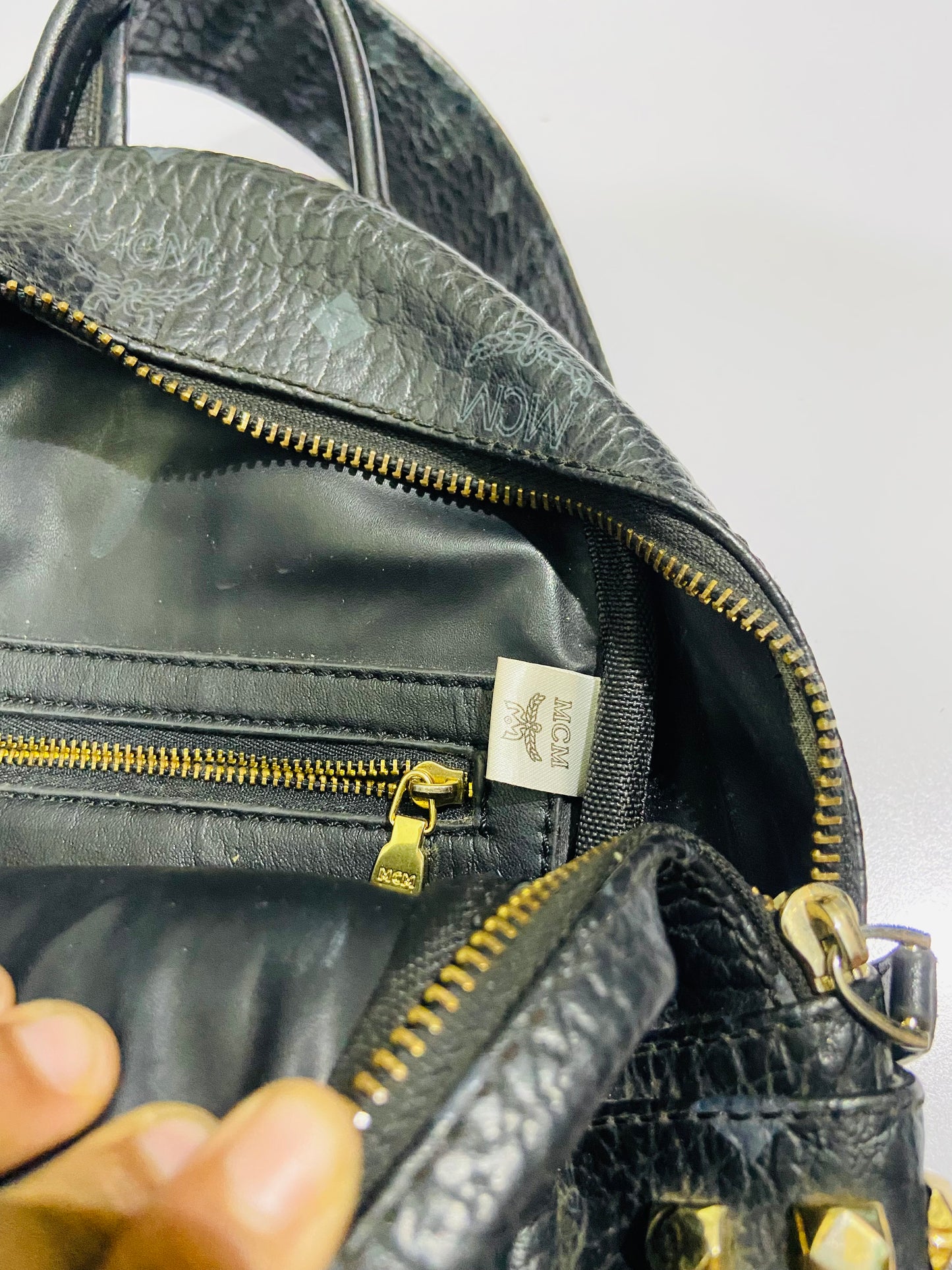 MCM Stark Backpack bag in black Visetos canvas.