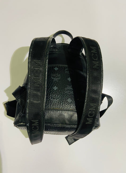 MCM Stark Backpack bag in black Visetos canvas.