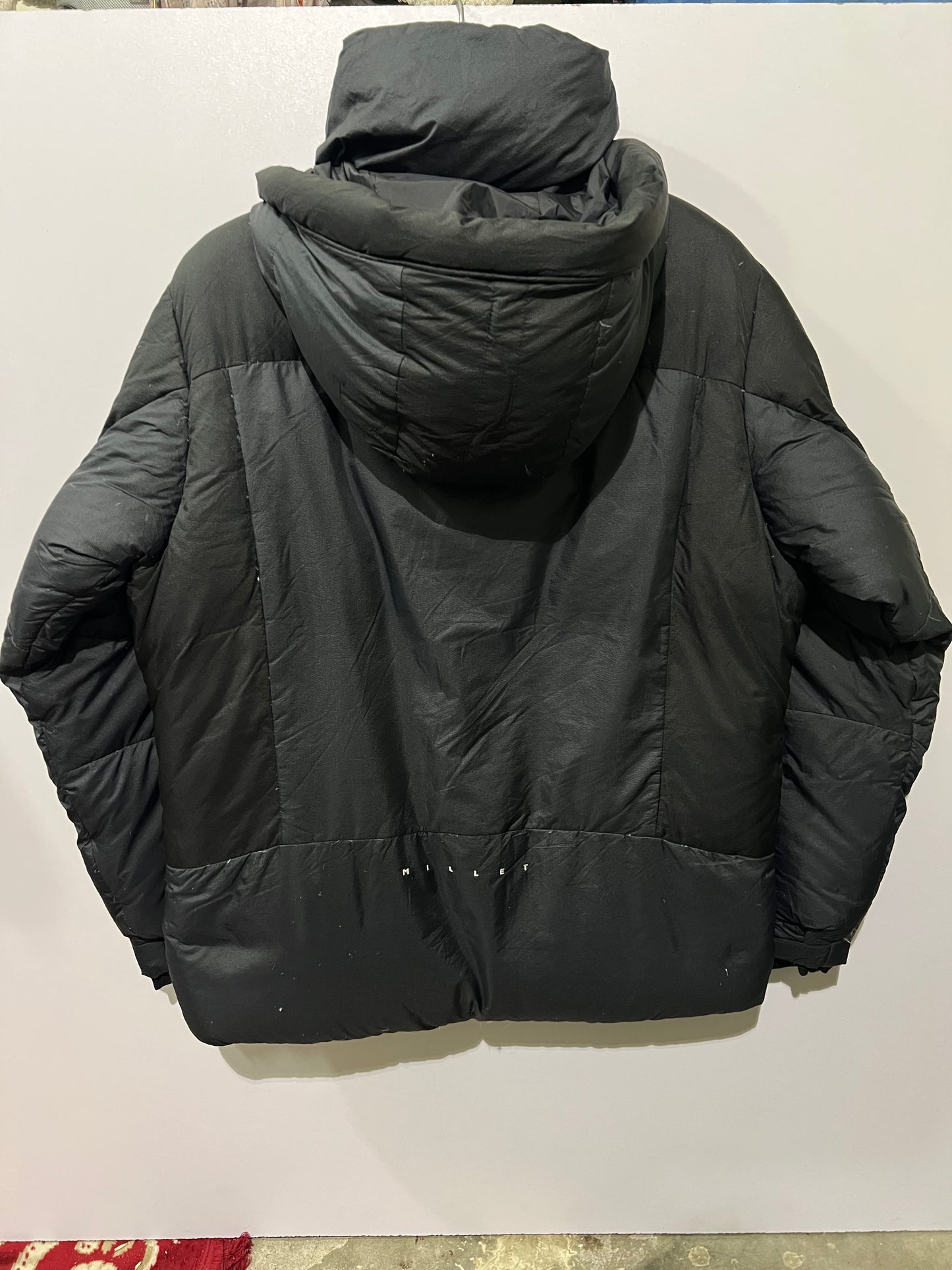 Millet down parka features an embroidered jacket