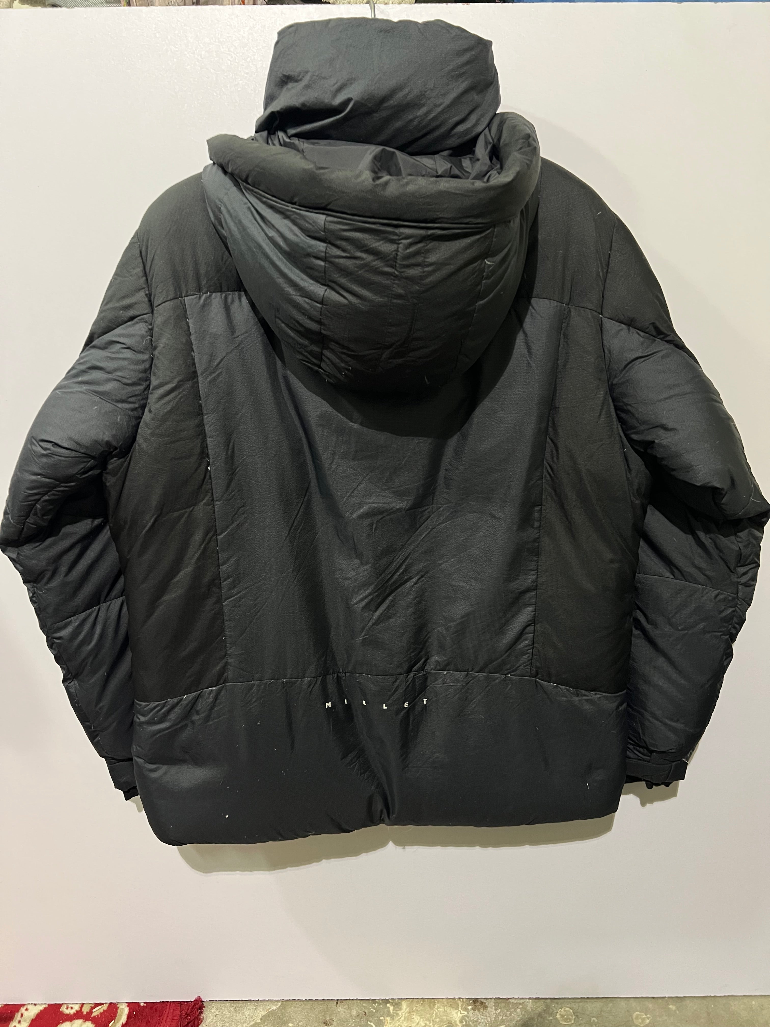 Millet down parka features an embroidered jacket