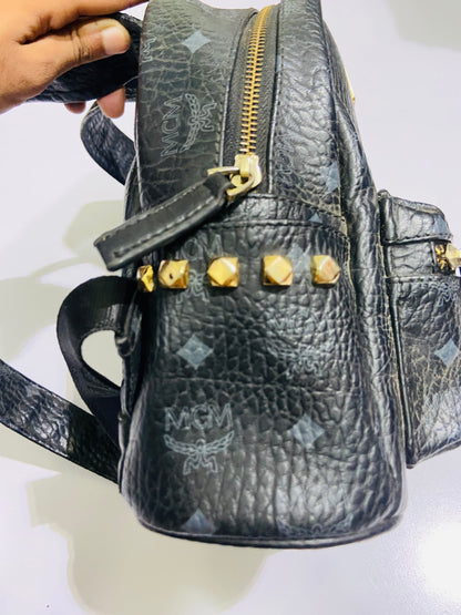 MCM Stark Backpack bag in black Visetos canvas.