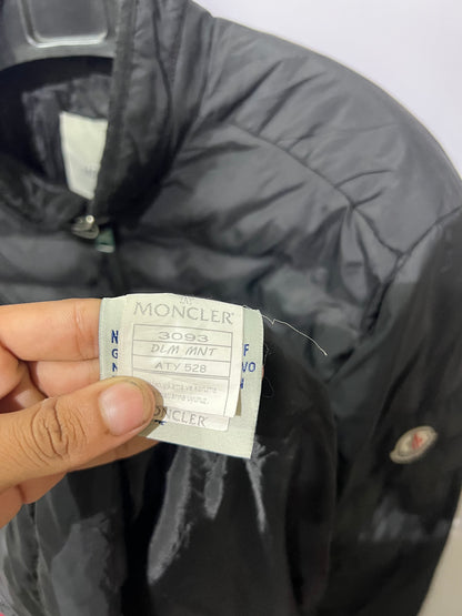 Moncler Hanriot puffer jacket featuring a black quilted