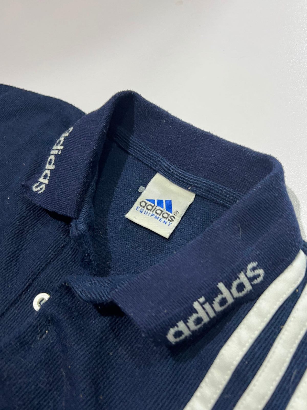 Adidas down shoulder shirt