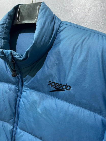 Speedo puffer jacket features a high collar and quilted construction for warmth.