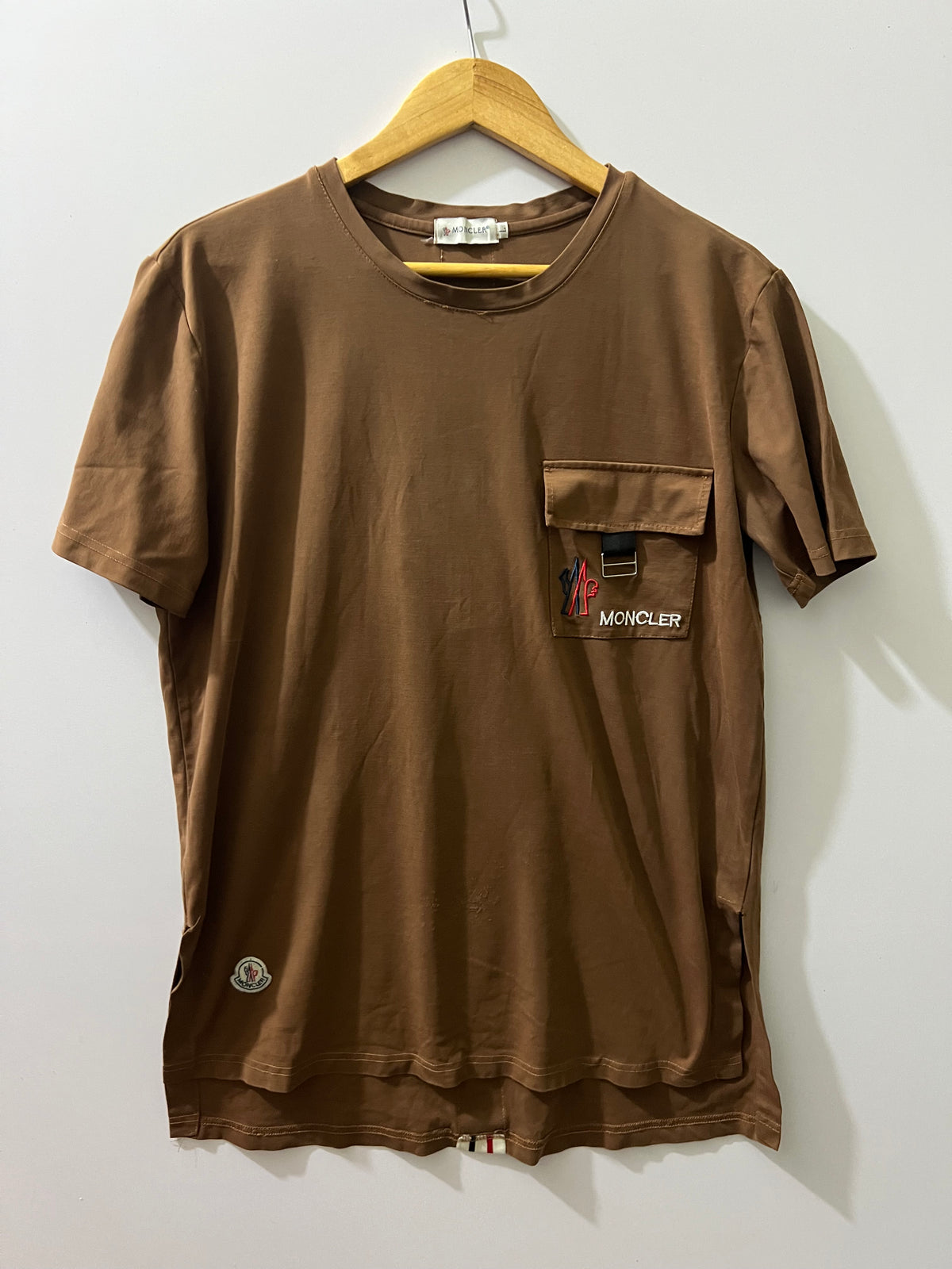 Moncler cotton crewneck T-shirt from Moncler features a prominent utility patch pocket