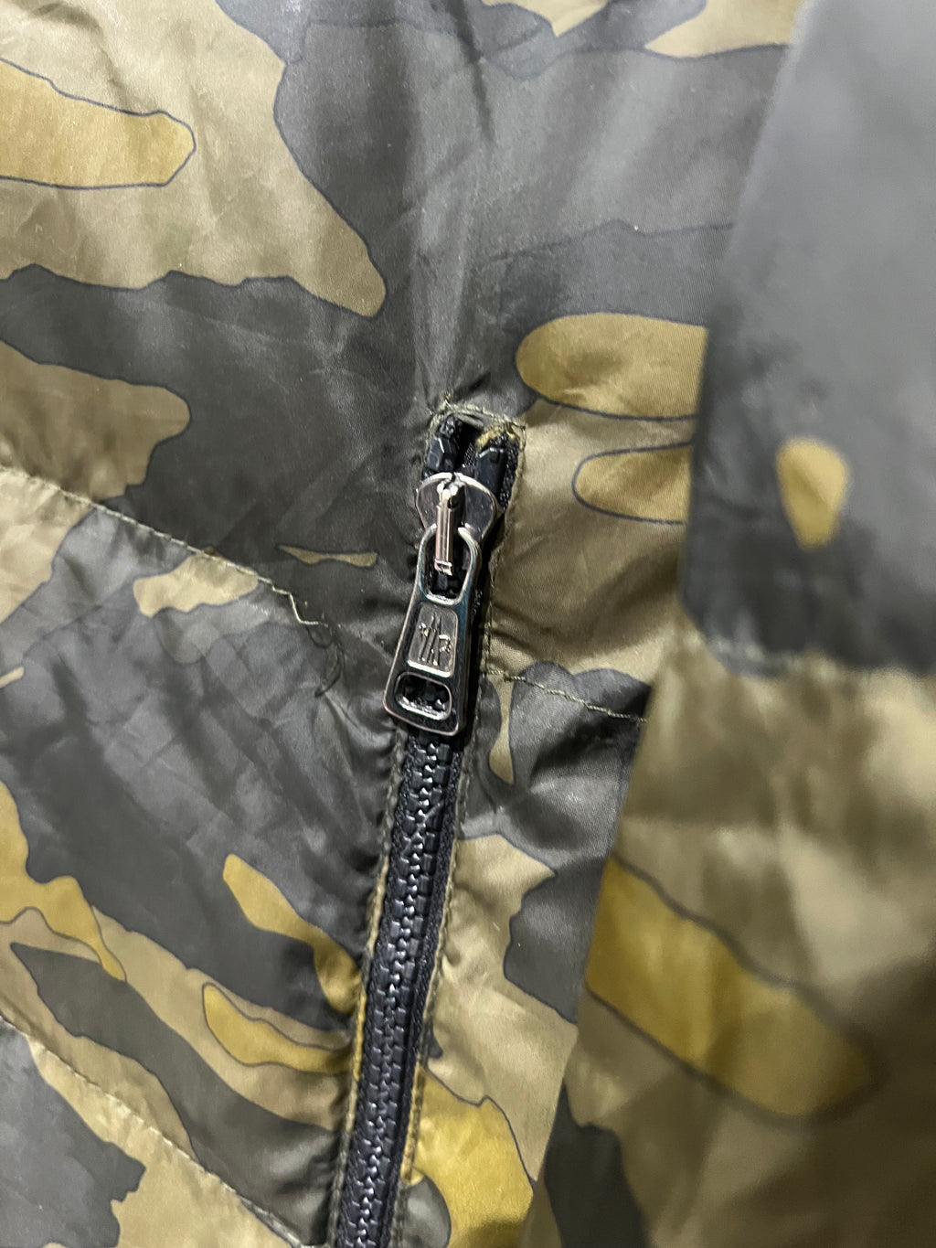 Moncler Nath windbreaker features a distinctive camouflage jacket