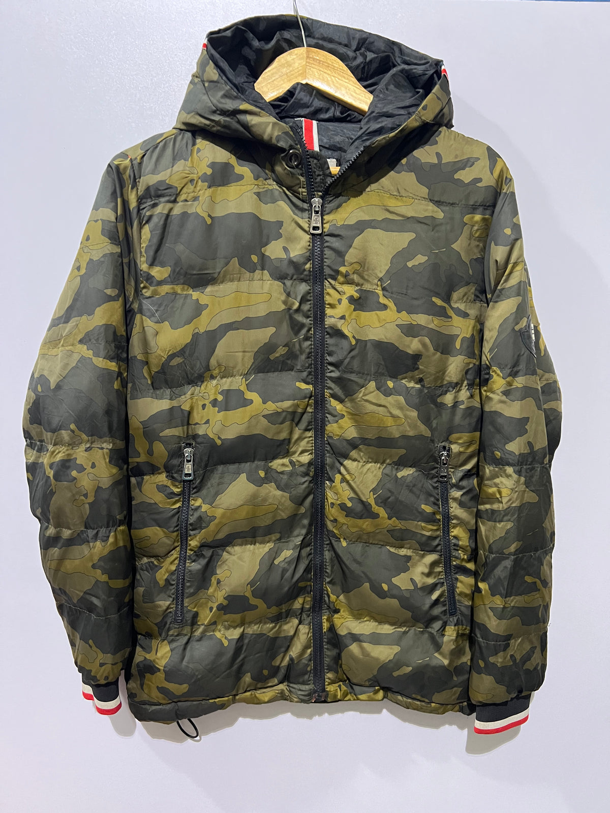 Moncler Nath windbreaker features a distinctive camouflage jacket
