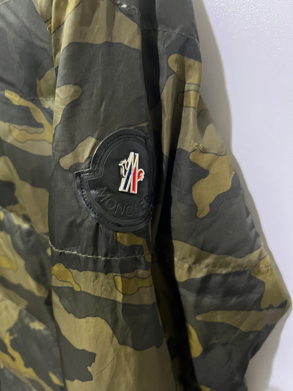 Moncler Nath windbreaker features a distinctive camouflage jacket