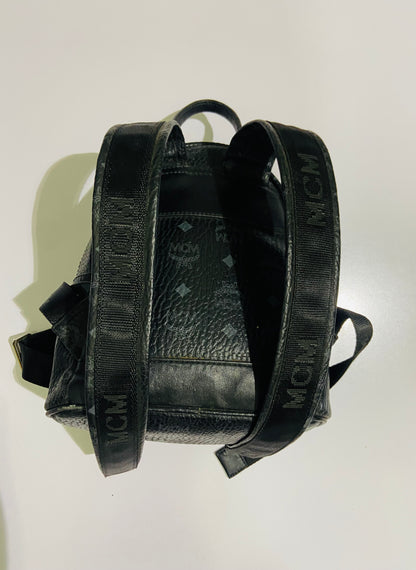 MCM Stark Backpack bag in black Visetos canvas.