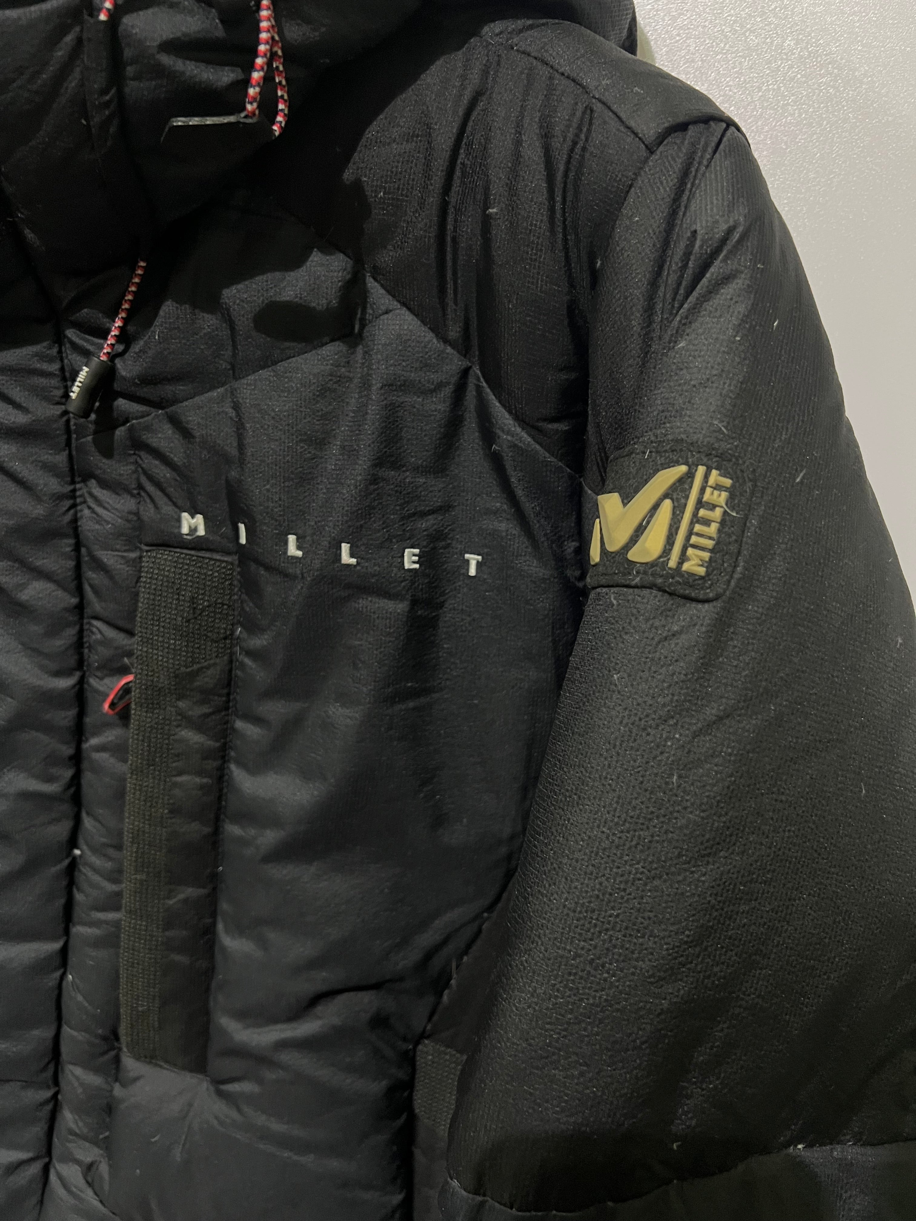 Millet down parka features an embroidered jacket